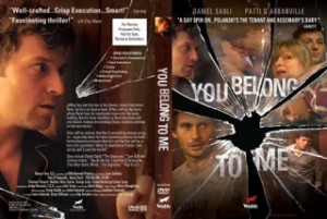 DVD cover for the film You Belong to Me. Image of 8 actors/characters in the film set in a fractured pane of glass. Verso credits included.